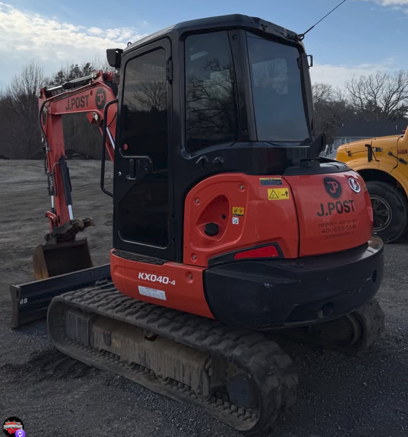 Excavator cab glass